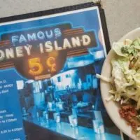A menu from Coney Island Diner in Mansfield Ohio and a salad