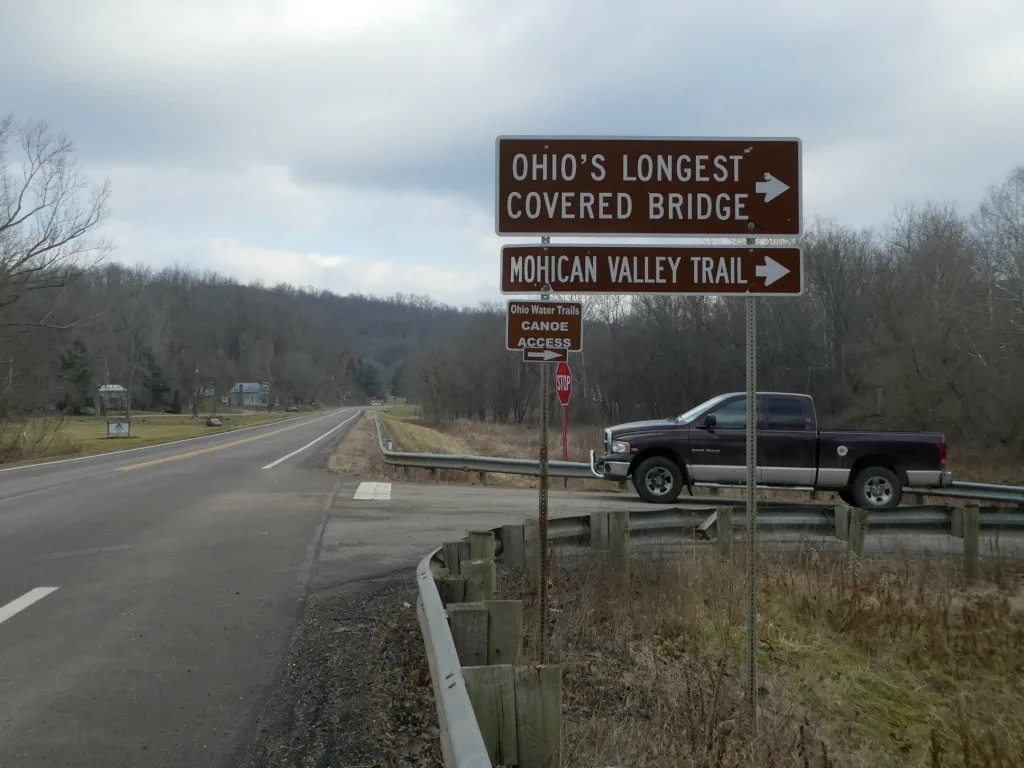 This sign points the way to the Bridge of Dreams, but it's no longer accurate and needs updated.