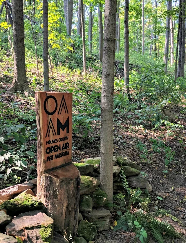 The Sign pointing towards the Open Air Art Museum in Holmes County. 