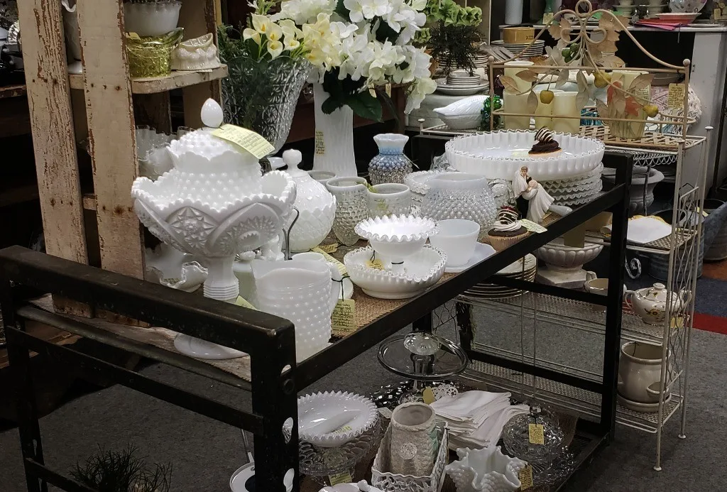 table full of milk glass